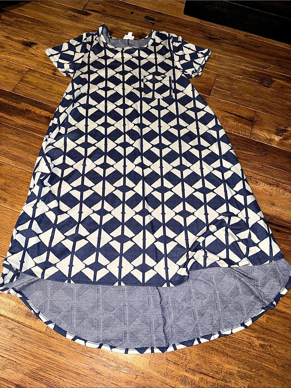 LuLaRoe Carly swing dress in a blue and gray geometric triangle print.